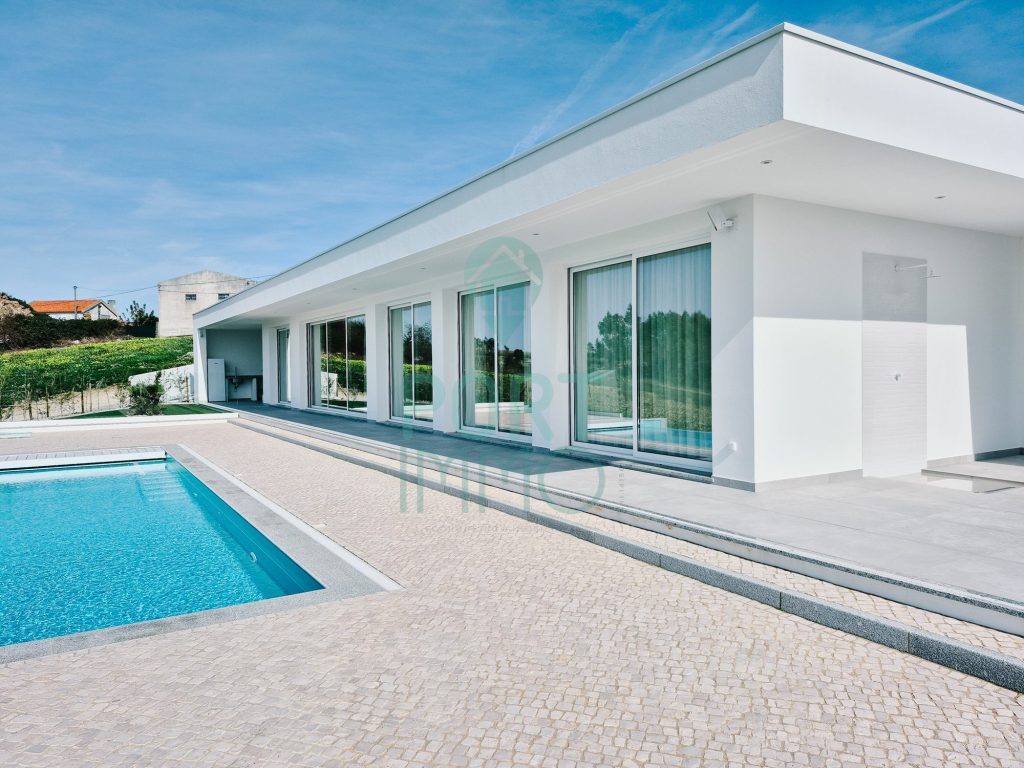 Pool terrace along the contemporary facade