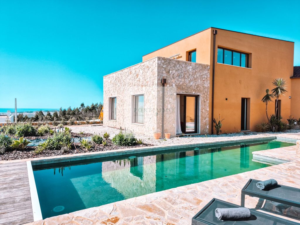 Contemporary villa with natural stone walls and swimming pool