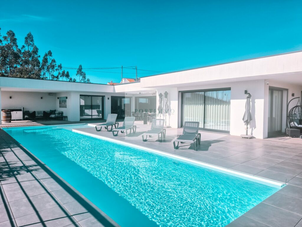 Contemporary villa with long swimming pool and terrace